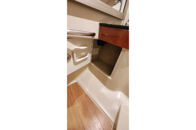 Slide: The Image of 2011 Formula 310 FX5 Bowrider interior with sleek black and wood accents. - 30