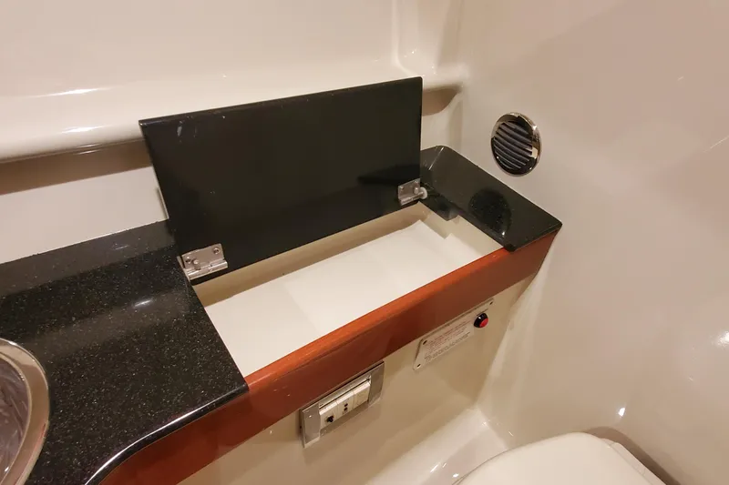 Slide: The Image of Luxurious interior of 2011 Formula 310 FX5 Bowrider with plush seating and entertainment system. - 31