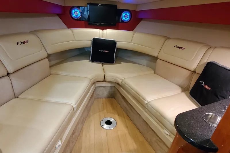 Slide: The Image of Luxurious interior of 2011 Formula 310 FX5 Bowrider with plush seating and entertainment system. - 32