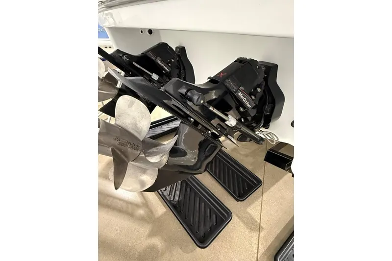 Slide: The Image of 2011 Formula 310 FX5 boat with MerCruiser outdrive and propeller detail. - 45