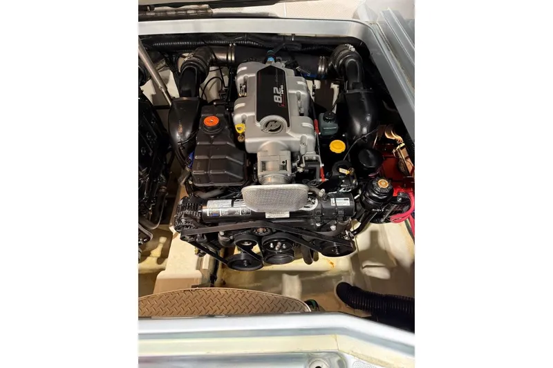 Slide: The Image of Engine compartment of a 2011 Formula 310 FX5 boat, showcasing detailed components. - 46