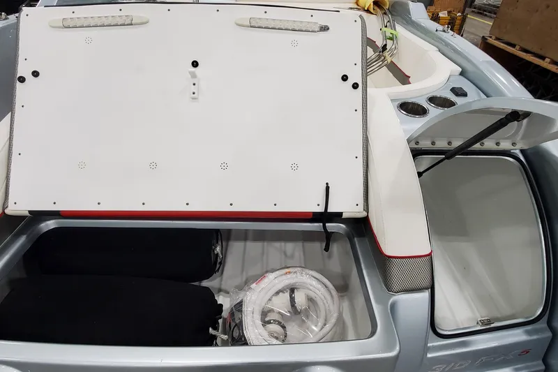 Slide: The Image of 2011 Formula 310 FX5 Bowrider boat with open hatch and ladder, viewed from above. - 6