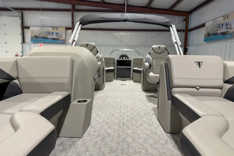 Slide: The Image of 2025 Trifecta 22RF LE pontoon boat interior with luxurious seating and modern design. - 12