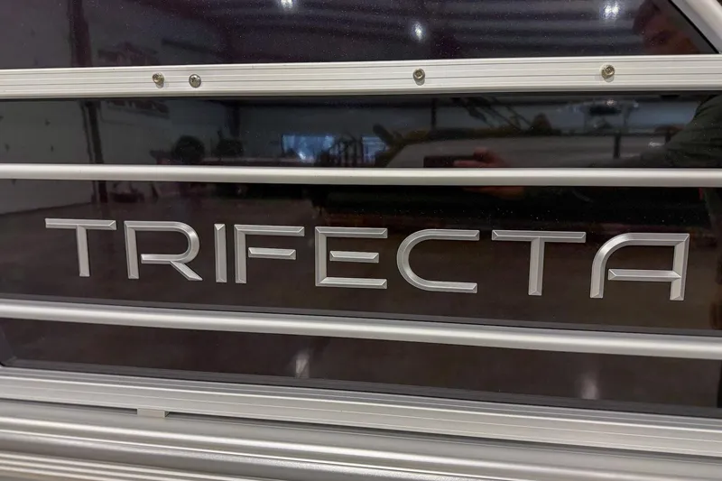 Slide: The Image of Trifecta 22RF LE 2025 model nameplate on a sleek metallic surface. - 5