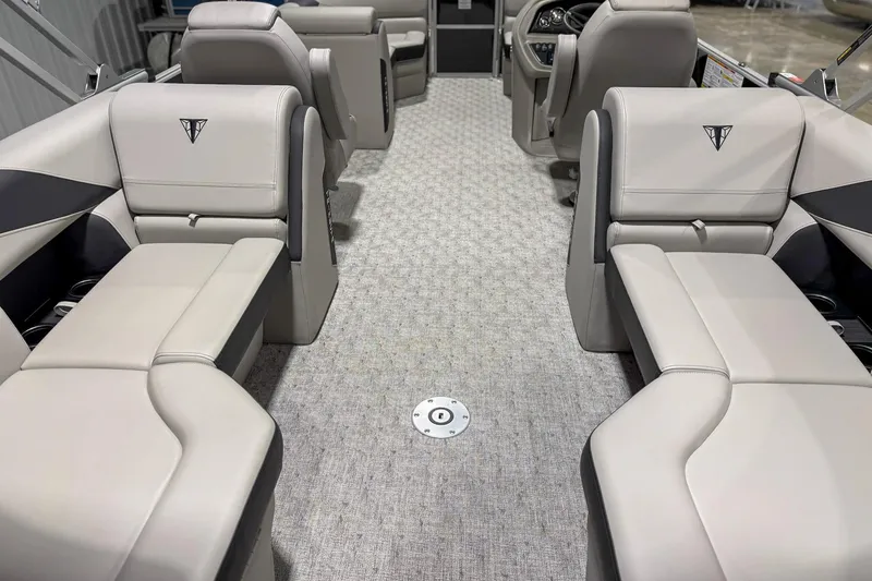 Slide: The Image of Luxurious interior of 2025 Trifecta 22RF LE pontoon boat with plush seating. - 6