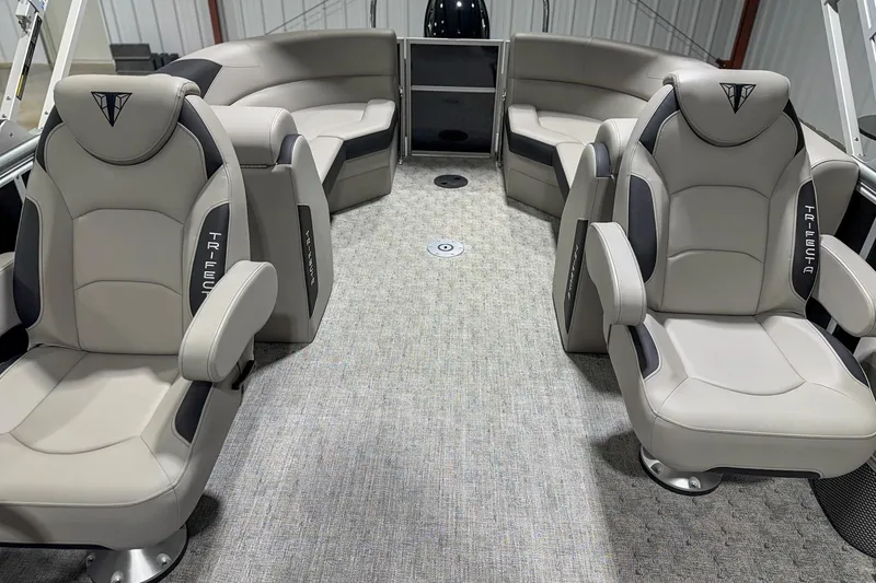Slide: The Image of Luxurious interior of 2025 Trifecta 22RF LE pontoon boat with plush seating. - 7