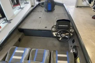 Slide: The Image of 2023 Ranger RT188 boat interior with steering console and seating. - 4