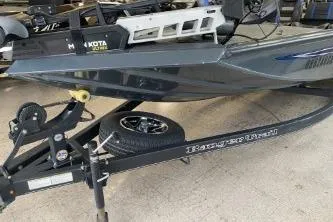 Slide: The Image of 2023 Ranger RT188 boat on trailer, featuring Minn Kota trolling motor. - 9