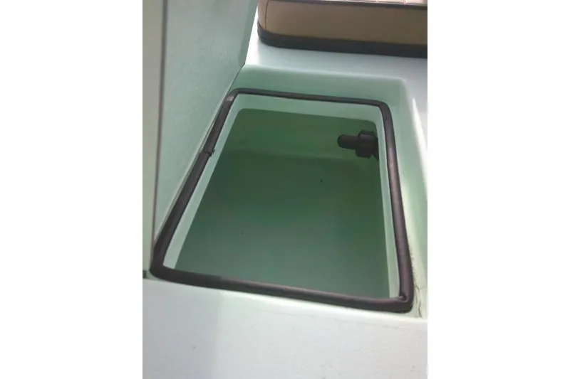 Slide: The Image of 2020 Skimmer Skiff 14 SKIFF storage compartment with rubber seal. - 16
