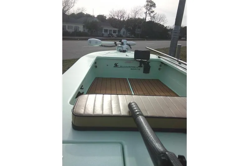 Slide: The Image of 2020 Skimmer Skiff 14 SKIFF boat interior with wooden deck and seating. - 17