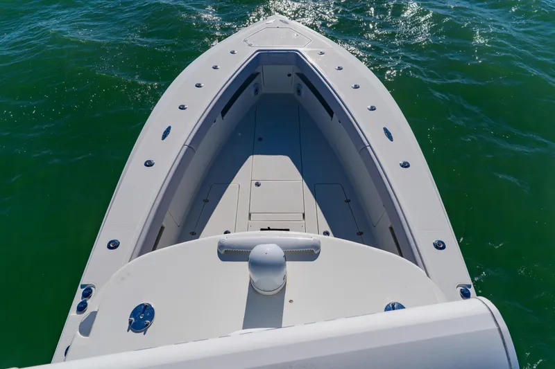 Slide: The Image of 2012 SeaVee 390B boat bow on calm green water, top view. - 8