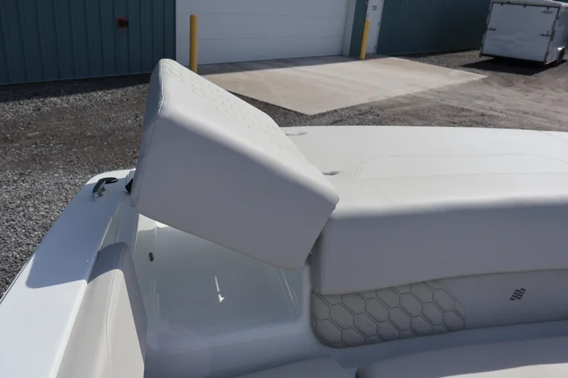 Slide: The Image of 2026 Four Winns H1 Freedom boat with adjustable seating in a marina setting. - 10