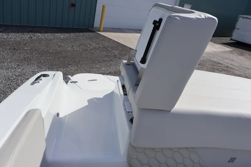 Slide: The Image of 2026 Four Winns H1 Freedom boat interior with white seating and sleek design. - 11