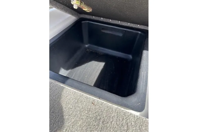 Slide: The Image of Storage compartment in 2022 Nitro Z19 Sport boat, open lid view. - 15