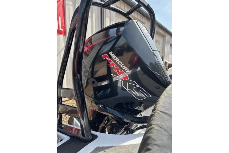 Slide: The Image of 2022 Nitro Z19 Sport with Mercury Pro XS engine, outdoor setting. - 2