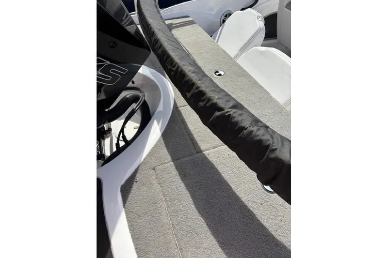 Slide: The Image of 2022 Nitro Z19 Sport boat interior with cushioned seating and sleek design. - 5