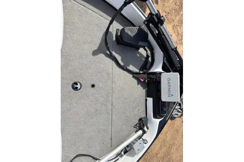 Slide: The Image of 2022 Nitro Z19 Sport boat deck with Garmin equipment and foot pedal. - 6