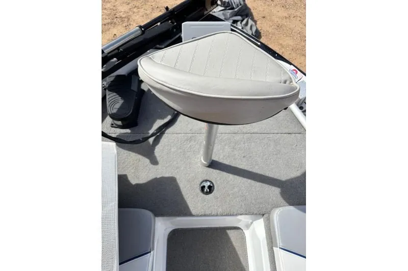 Slide: The Image of 2022 Nitro Z19 Sport boat seat on carpeted deck, featuring sleek design and comfort. - 8