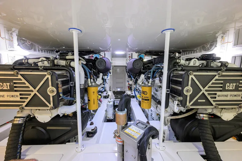 Slide: The Image of Engine room of 2015 Viking 62 Convertible yacht with CAT marine power engines. - 67
