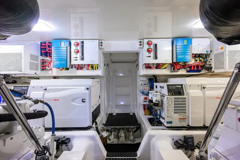 Slide: The Image of Engine room of 2015 Viking 62 Convertible yacht with Cummins Onan generators. - 68