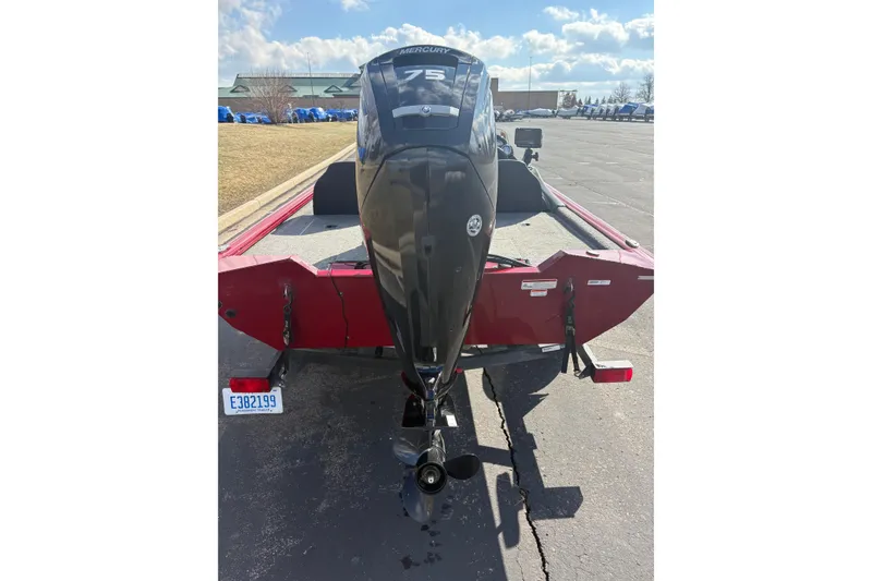 Slide: The Image of 2021 Tracker Pro Team 175 TXW Tournament Edition boat with Mercury engine, rear view. - 6