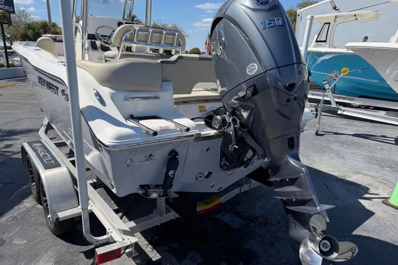 Slide: The Image of 2026 Key West 203 FS boat on trailer with Yamaha 150 outboard motor. - 11