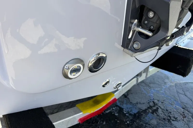 Slide: The Image of 2026 Key West 203 FS boat rear view with LED lights and trailer. - 13