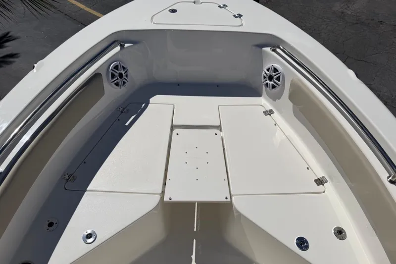 Slide: The Image of 2026 Key West 203 FS boat interior with seating and speakers. - 24