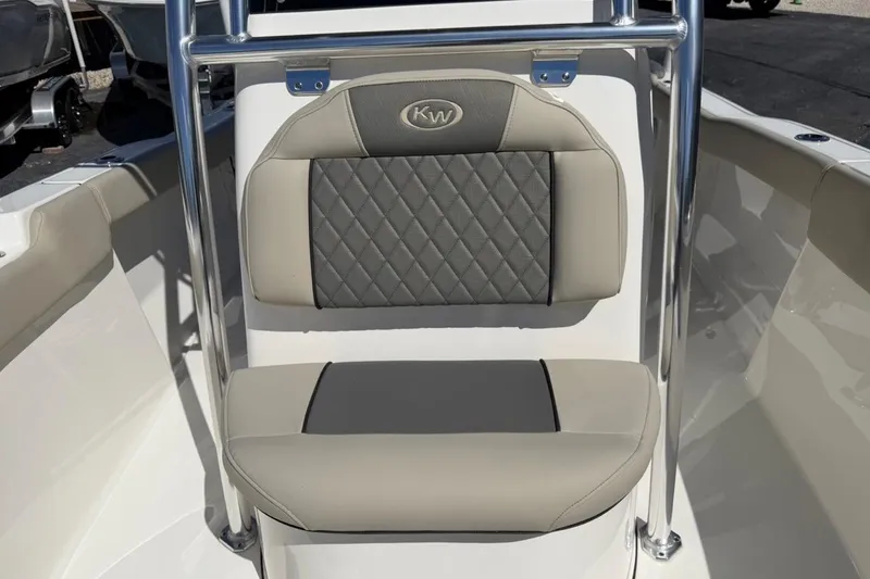 Slide: The Image of 2026 Key West 203 FS boat seat with quilted gray and beige upholstery. - 26