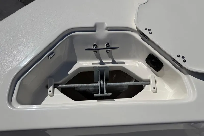 Slide: The Image of Anchor storage compartment on 2026 Key West 203 FS boat, featuring a sleek design. - 38