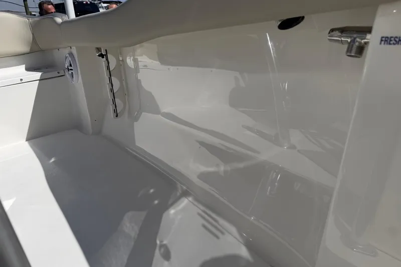 Slide: The Image of Interior view of 2026 Key West 203 FS boat, featuring sleek white design and fixtures. - 39