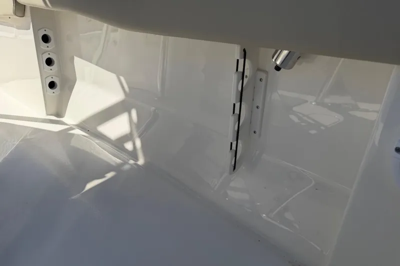 Slide: The Image of Interior view of 2026 Key West 203 FS boat, showcasing sleek white design and fittings. - 40