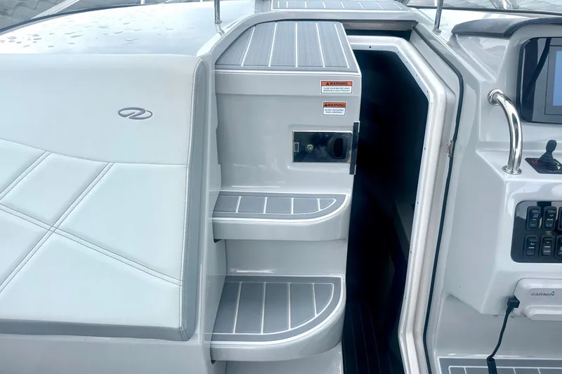 Slide: The Image of 2025 Regal 26 XO boat interior with steps and control panel. - 37