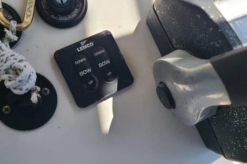 Slide: The Image of Control panel on 2006 Sea Fox 287 Center Console boat with Lenco trim tab switches. - 10