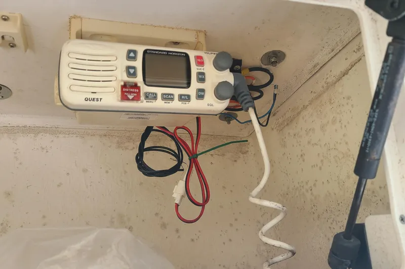 Slide: The Image of VHF radio equipment inside a 2006 Sea Fox 287 Center Console boat. - 11