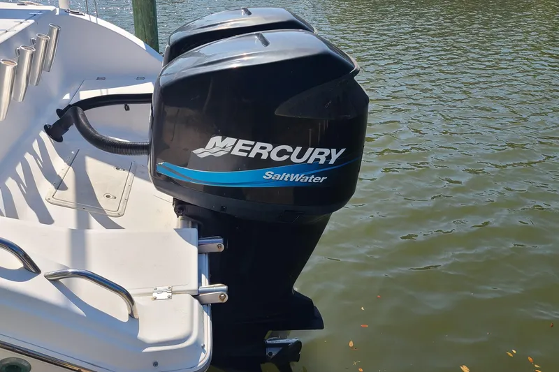 Slide: The Image of 2006 Sea Fox 287 Center Console with Mercury Saltwater outboard engine on water. - 20