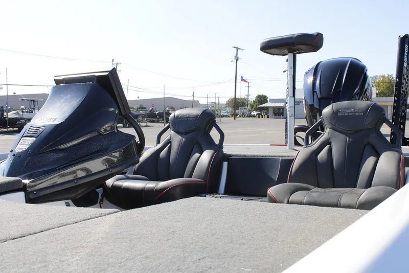 Slide: The Image of 2022 Skeeter ZXR21 boat interior with seats and control panel. - 12