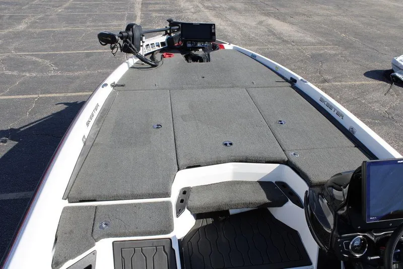 Slide: The Image of 2022 Skeeter ZXR21 boat deck with advanced navigation equipment and spacious layout. - 17