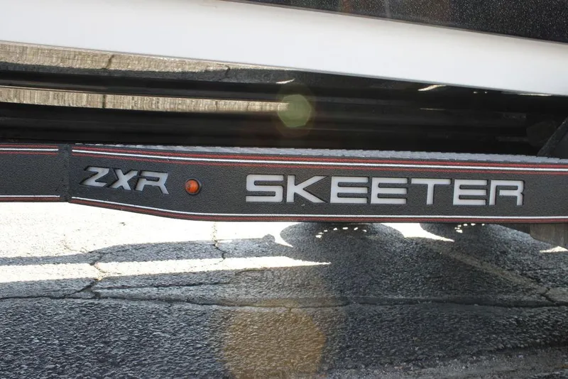 Slide: The Image of 2022 Skeeter ZXR21 boat trailer with logo and model name visible. - 7