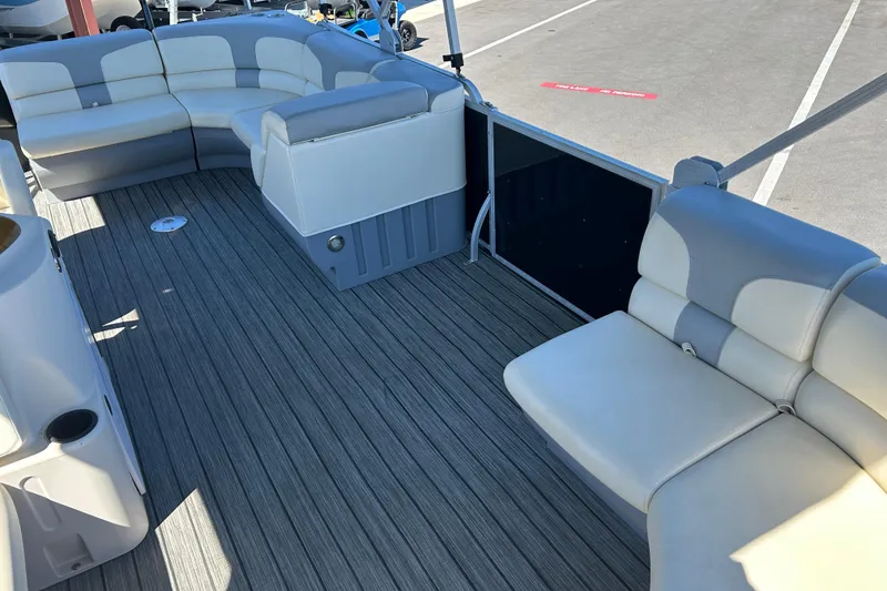 Slide: The Image of 2022 Lexington 317 series boat interior with spacious seating and modern design. - 10