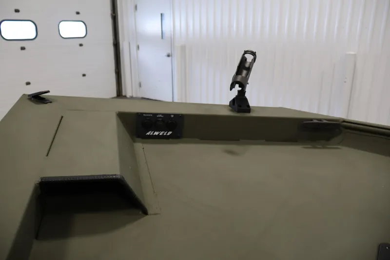 Slide: The Image of 2025 Alweld 1648 Marsh boat interior with control panel and mount. - 10