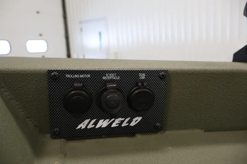 Slide: The Image of 2025 Alweld 1648 Marsh boat panel with trolling motor, 12V, and dual USB ports. - 11