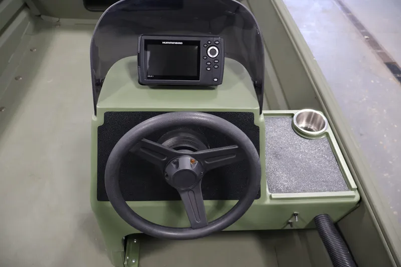 Slide: The Image of 2025 Alweld 1648 Marsh boat console with steering wheel and navigation display. - 16