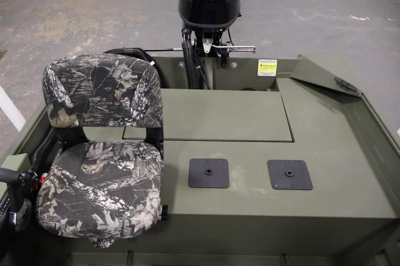 Slide: The Image of 2025 Alweld 1648 Marsh boat interior with camo seat and motor. - 19