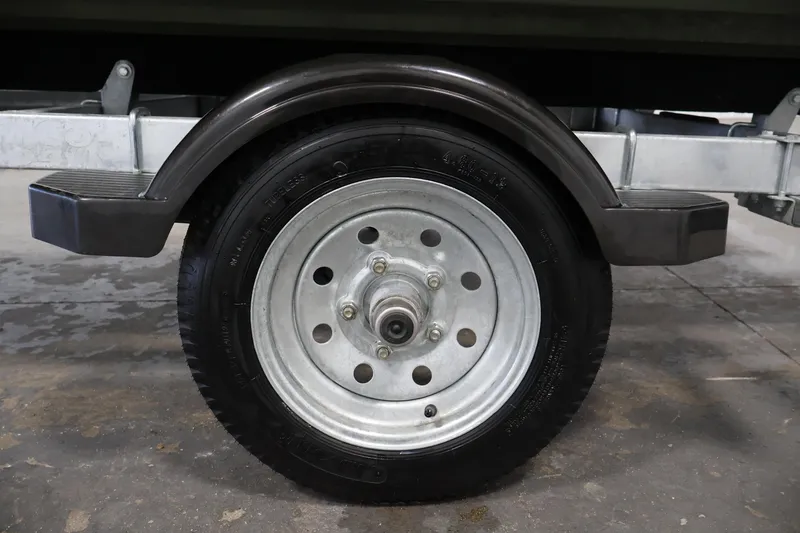 Slide: The Image of Trailer wheel of 2025 Alweld 1648 Marsh boat, featuring a sturdy metal rim. - 30