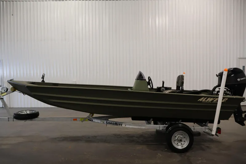 Slide: The Image of 2025 Alweld 1648 Marsh boat on trailer in indoor setting. - 7