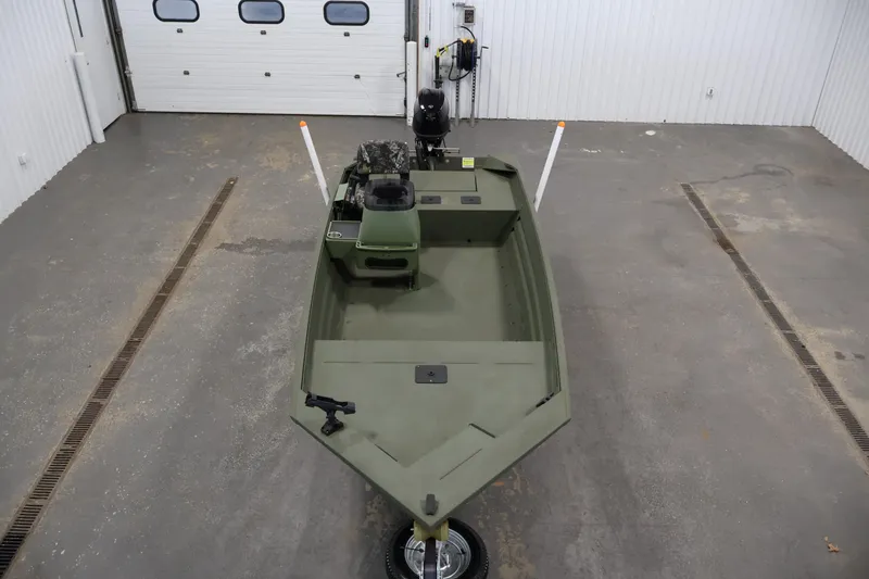 Slide: The Image of 2025 Alweld 1648 Marsh boat in a garage, top view. - 8