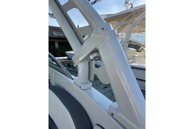 Slide: The Image of 2022 Crownline 255 SS SURF boat interior with seating and table. - 12