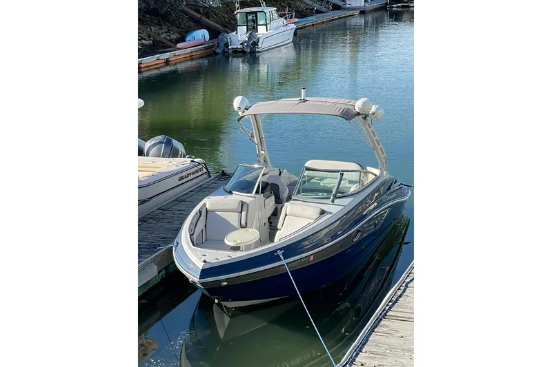 Slide: The Image of Engine compartment of 2022 Crownline 255 SS SURF boat, showcasing detailed components. - 27