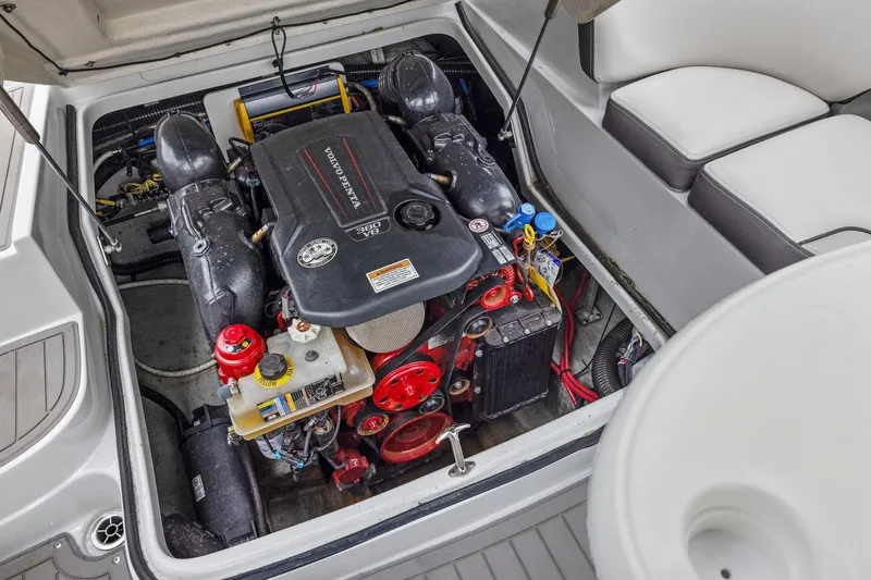 Slide: The Image of 2022 Crownline 255 SS SURF boat engine compartment with Volvo Penta engine. - 39
